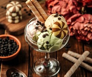 Ice cream dessert enhanced with flavor additives for enriched taste experience